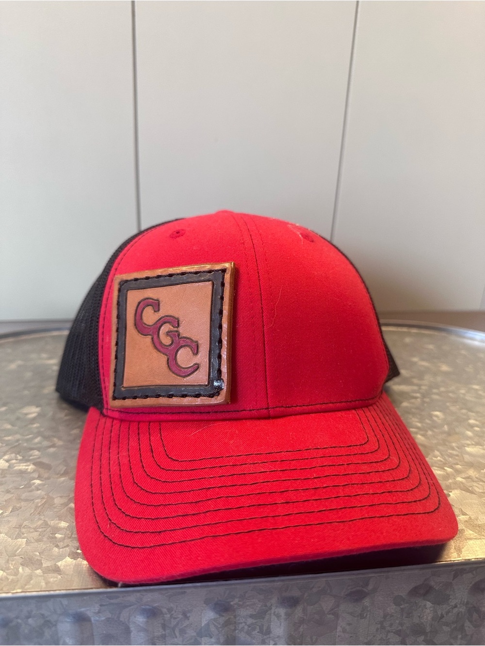 CHANEL Red & Black Trucker Hat with Leather Patch